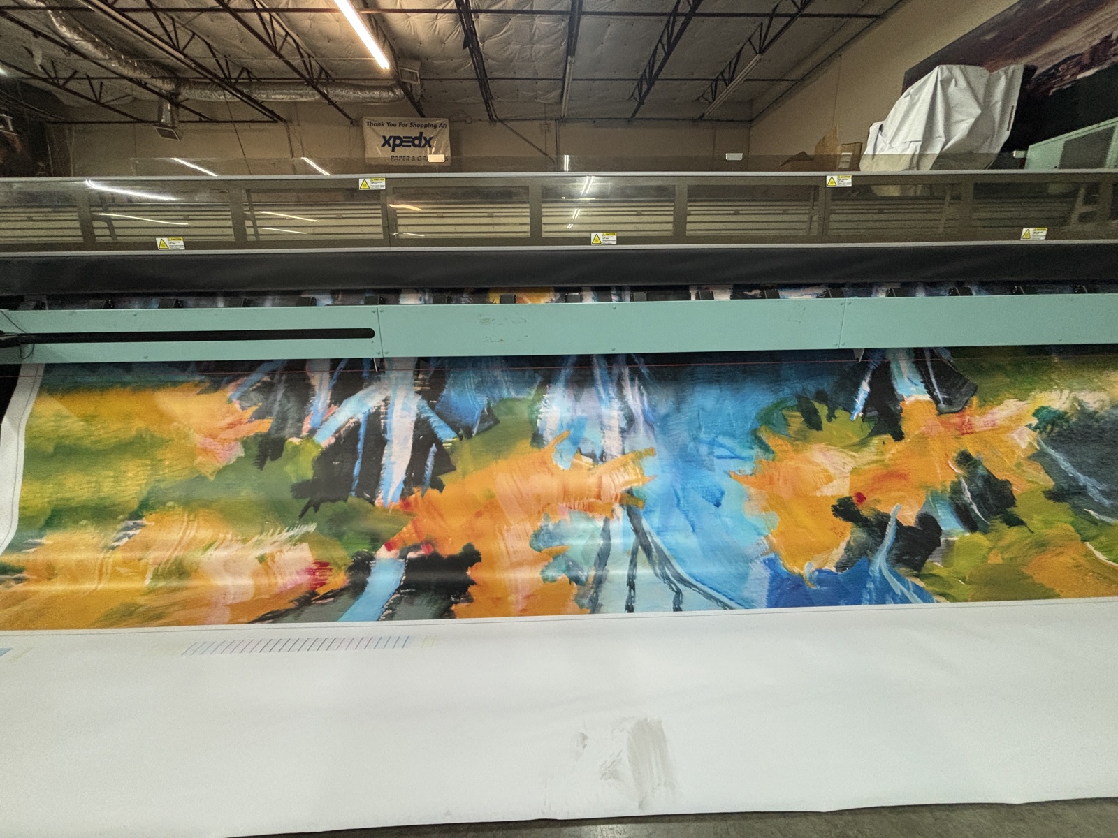 Colorful billboard graphic printing on a wide-format printer